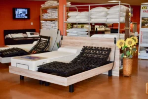 Sommier électrique exposé en magasin Ox-Literie à Muret avec réglages de confort